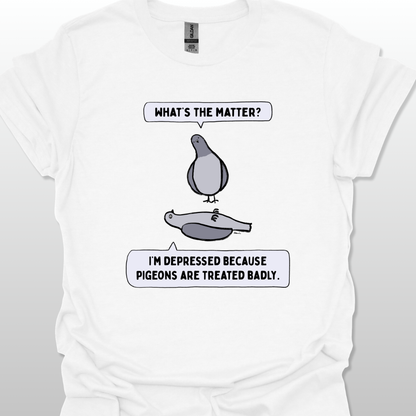 White t-shirt with a graphic of two pigeons saying, "What's the matter?" "I'm depressed because pigeons are treated badly." on a white background