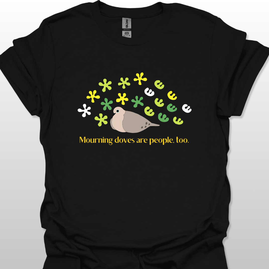 Black t-shirt with a graphic of a dove and flowers, text 'Mourning doves are people too.' on a white background