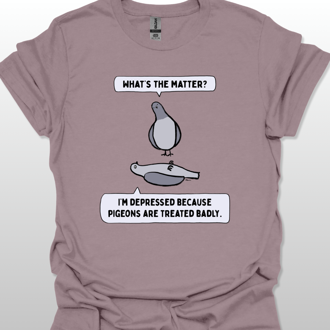 Paragon t-shirt with a graphic of two pigeons saying, "What's the matter?" "I'm depressed because pigeons are treated badly." on a white background