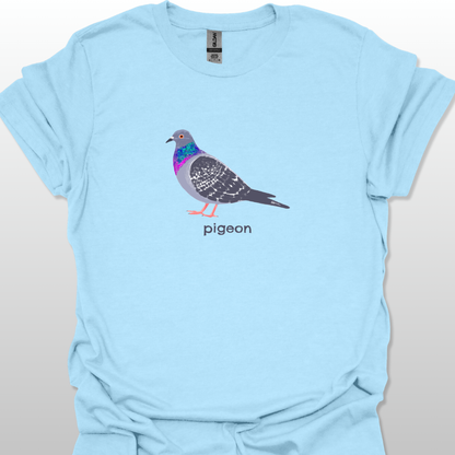 Light blue t-shirt with a pigeon graphic and 'pigeon' text on a light gray background