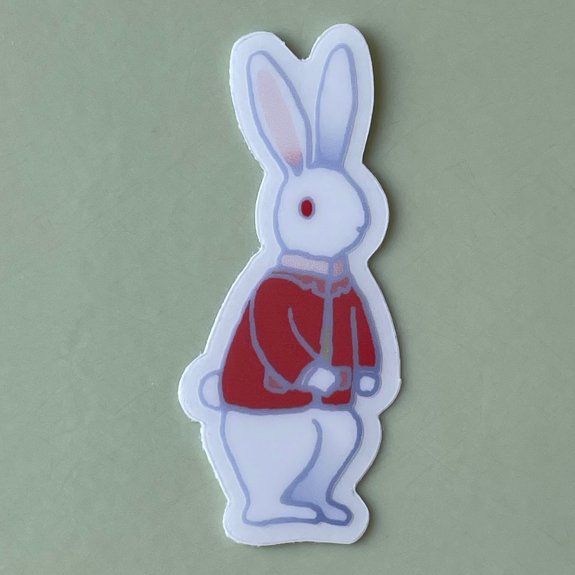 Sticker of The White Rabbit wearing a red coat