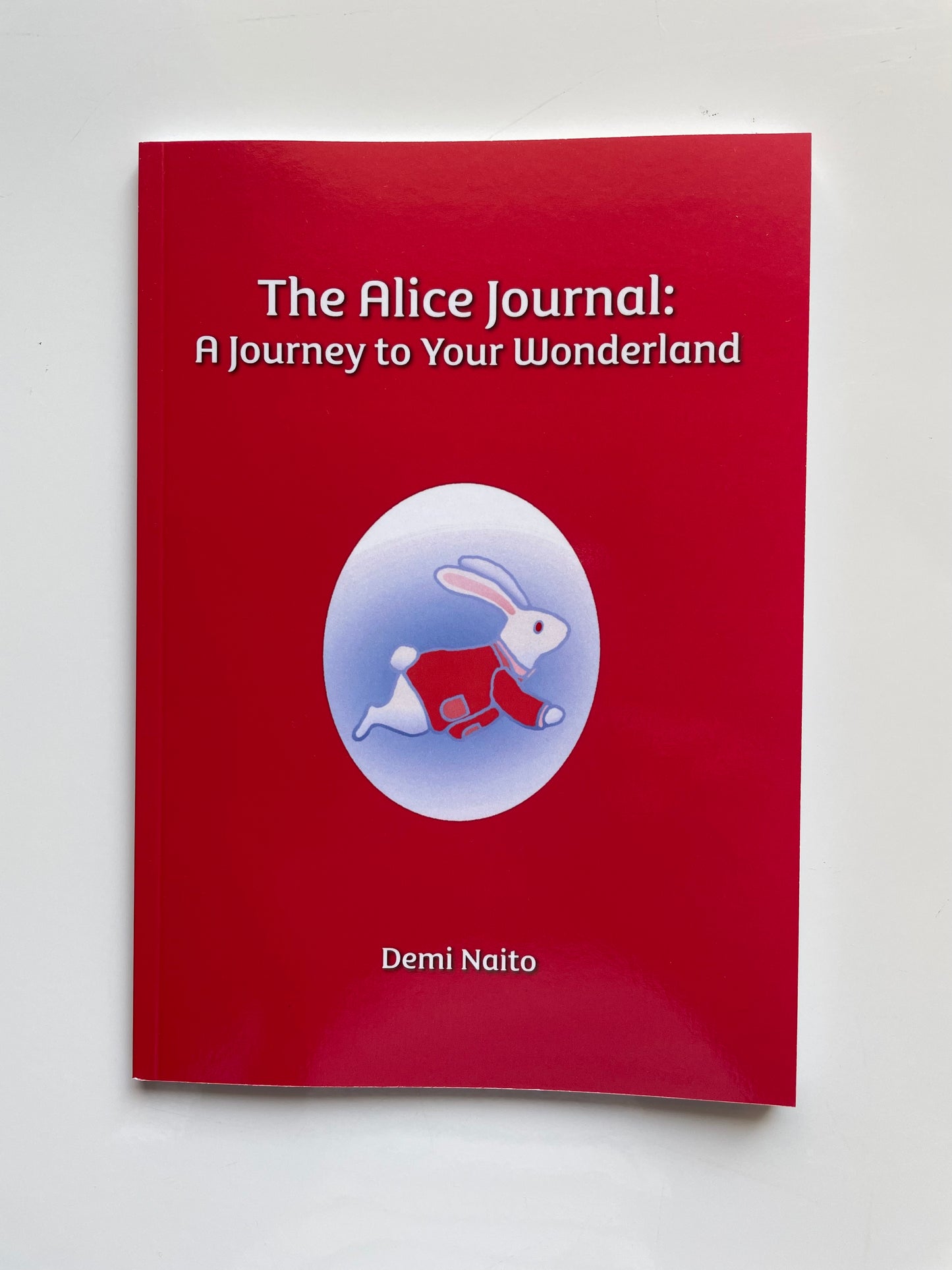 The softcover version of The Alice Journal